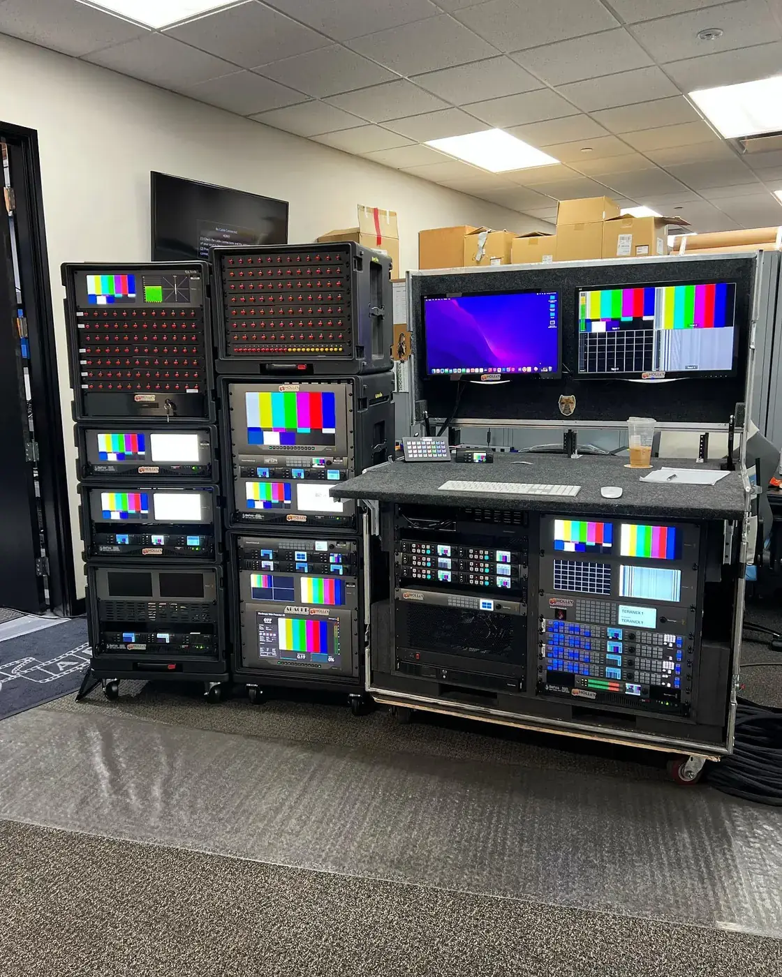 Holley Video distribution racks lit up in the shop