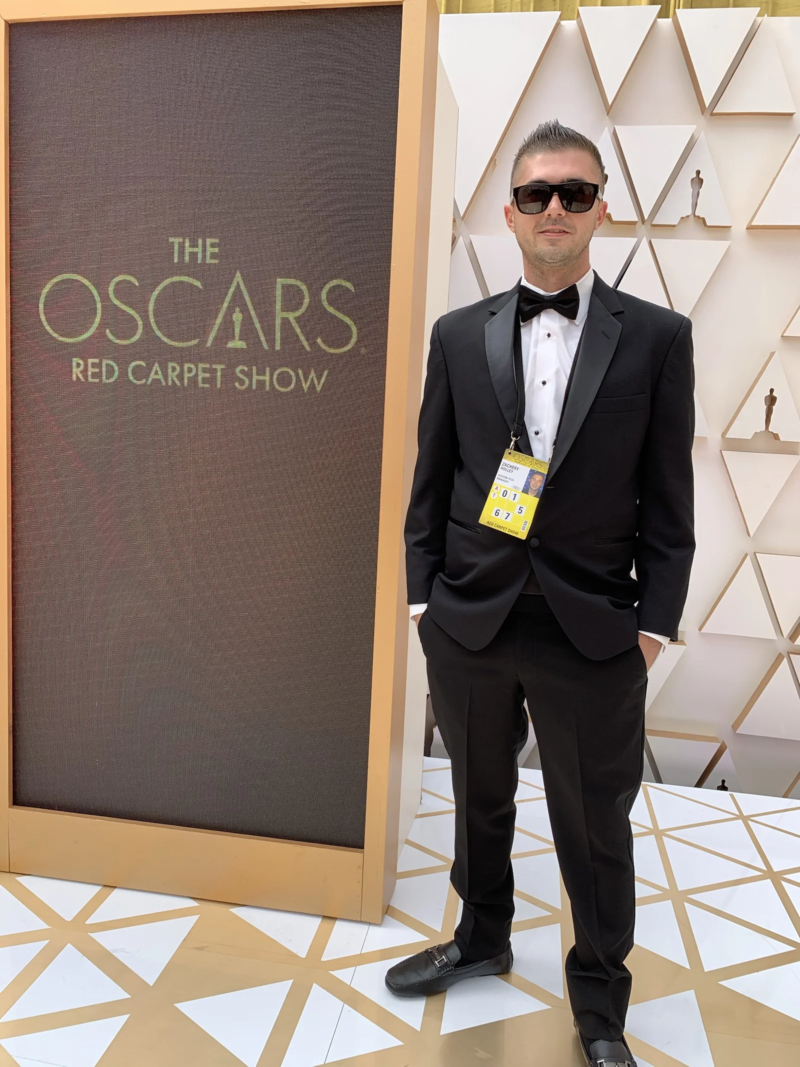 Zak Holley in a tuxedo at the Oscars Red Carpet Show