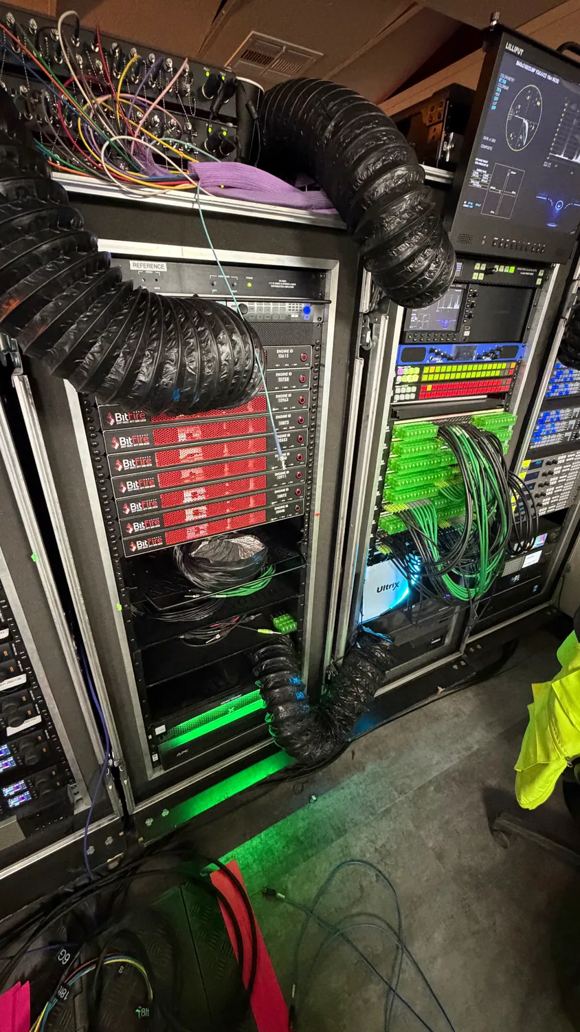 Road racks on site with Bitfire engines, routing and a pull-out monitor