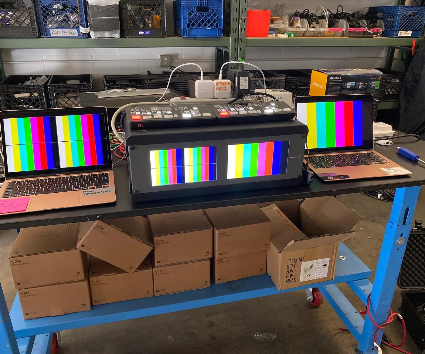 Record and monitor gear showing color bars on a shop bench